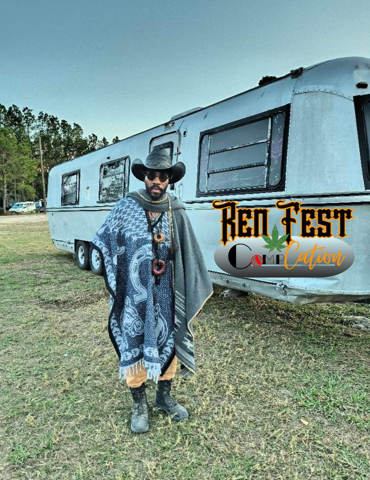 Person standing beside the silver Ren Fest CampCation trailer
